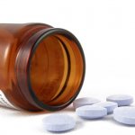 Jar with spilled pills