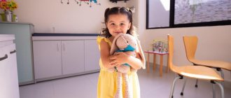 Girl in a yellow dress with a toy in the room