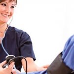 Doctor measuring blood pressure to patient